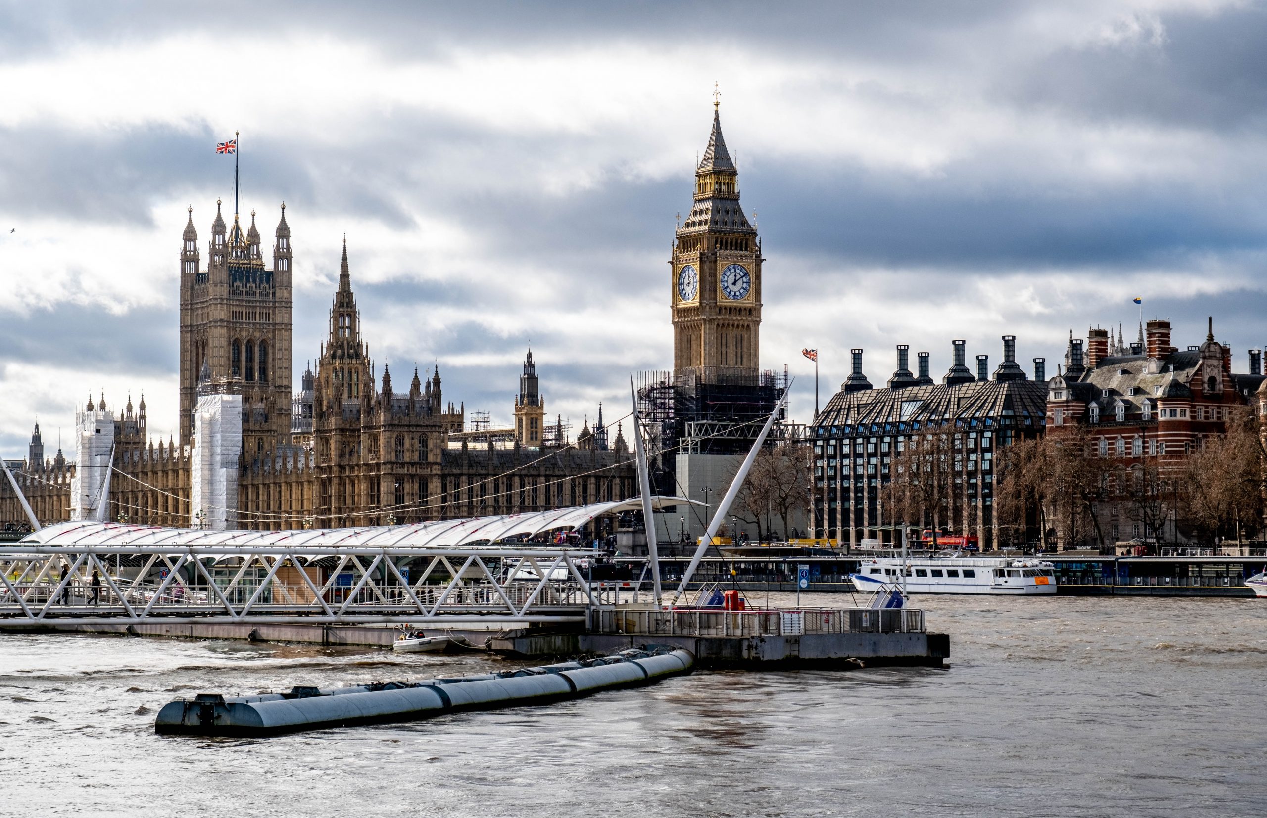 Houses of Parliament and Portcullis House viewed across the Thames